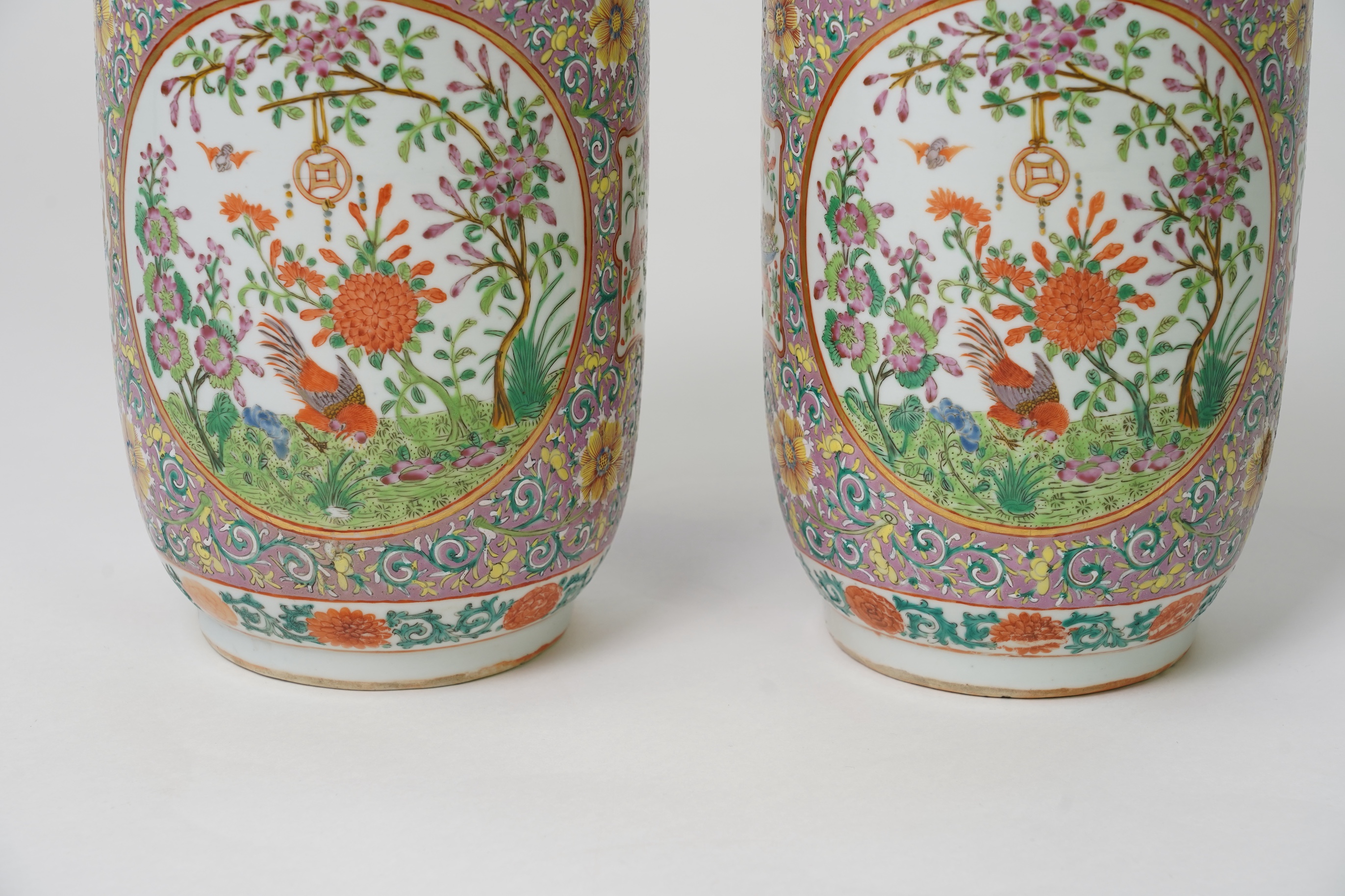A pair of Chinese famille rose vases, early 20th century